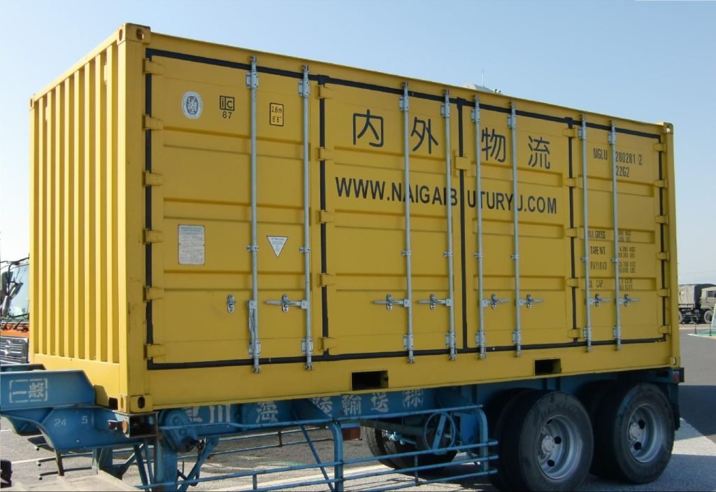 Yellow open side container ready to be shipped